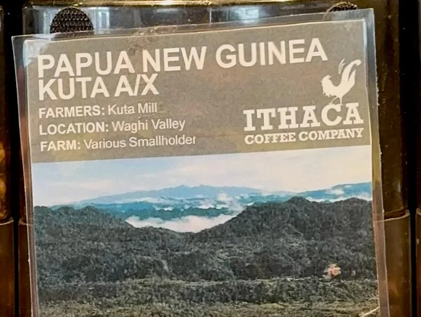 The Papua New Guinea Kuta A/X jar label at the roastery