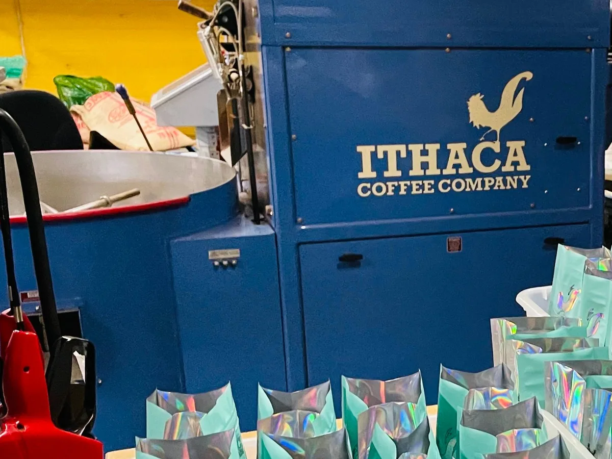 The roaster with the Ithaca Coffee Company name on its side